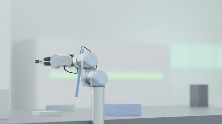 Braccio robotico in un laboratorio scientifico automatizzato, simbolo dei laboratori AI autonomi